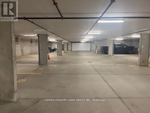 203 - 40 Horseshoe Boulevard, Oro-Medonte, ON - Indoor Photo Showing Garage