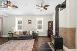 Ample windows and vinyl flooring. - 