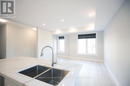 2 - 180 Prince Street W, Oshawa, ON - Indoor Photo Showing Kitchen With Double Sink