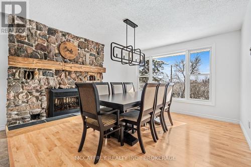 25 Jones Street, Stone Mills (Stone Mills), ON - Indoor Photo Showing Dining Room With Fireplace