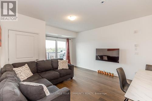 412 - 54 Koda Street, Barrie, ON - Indoor Photo Showing Living Room