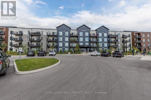 412 - 54 Koda Street, Barrie, ON - Outdoor With Balcony With Facade