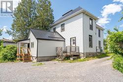 view of back bonus room/private business entrance - 