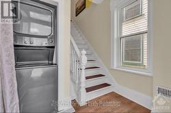 foyer of entrance to upper unit / laundry area - 