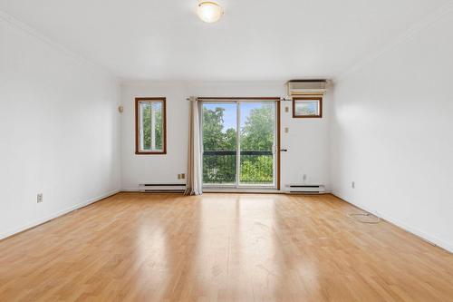Living room - 104-6772 Av. Papineau, Montréal (Rosemont/La Petite-Patrie), QC - Indoor Photo Showing Other Room