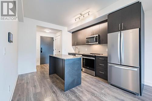414 - 345 Wheat Boom Drive, Oakville, ON - Indoor Photo Showing Kitchen