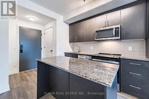 414 - 345 Wheat Boom Drive, Oakville, ON - Indoor Photo Showing Kitchen With Upgraded Kitchen