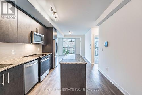 414 - 345 Wheat Boom Drive, Oakville, ON - Indoor Photo Showing Kitchen With Upgraded Kitchen