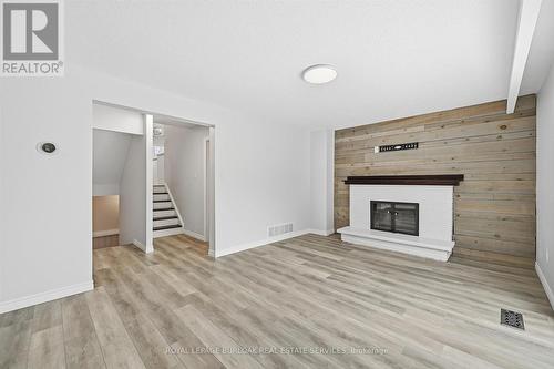 2344 Glastonbury Road, Burlington, ON - Indoor Photo Showing Other Room With Fireplace