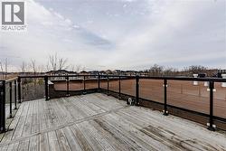 Wooden terrace with a residential view - 