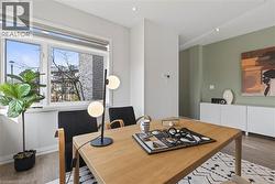 Dining area featuring light wood-style floors and recessed lighting - 