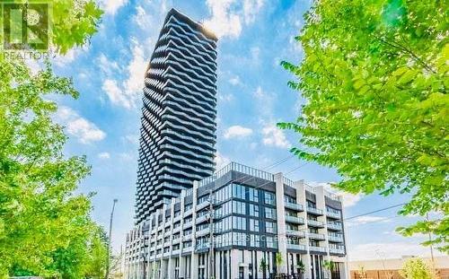 703 - 1195 The Queensway, Toronto, ON - Outdoor With Balcony With Facade