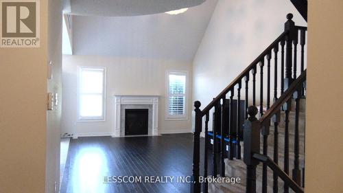 38 - 57 Muzzo Drive, Brampton, ON - Indoor Photo Showing Other Room With Fireplace