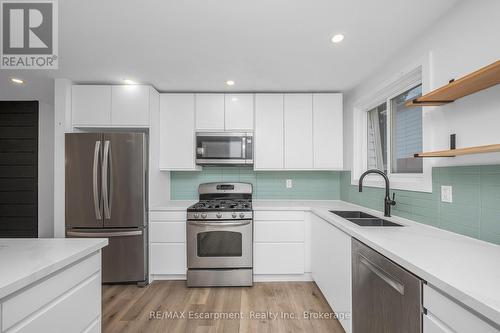 3346 Hannibal Road, Burlington (Palmer), ON - Indoor Photo Showing Kitchen With Double Sink