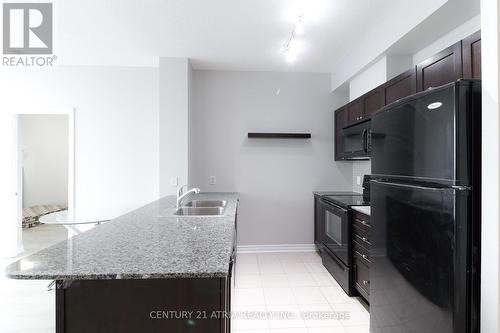 3108 - 3525 Kariya Drive, Mississauga, ON - Indoor Photo Showing Kitchen With Double Sink