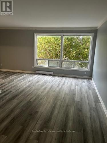 202 - 211 Nonquon Road, Oshawa, ON - Indoor Photo Showing Living Room