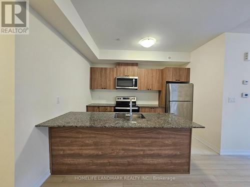 #5 - 155 Tapscott Road, Toronto, ON - Indoor Photo Showing Kitchen With Stainless Steel Kitchen