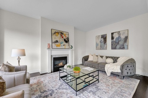 58 Orangeblossom Trail, Brampton, ON - Indoor Photo Showing Living Room With Fireplace