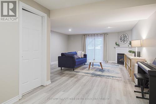 Finished Walkout Basement - 51 - 43 Capulet Walk, London North (North M), ON - Indoor With Fireplace