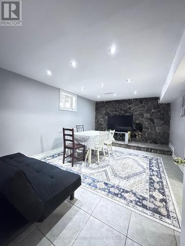 Bsmt - 10 Oakridge Drive, Toronto, ON - Indoor With Fireplace