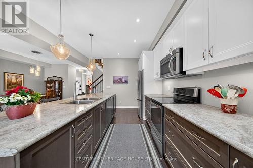7 - 80 Willow Street, Brant, ON - Indoor Photo Showing Kitchen With Double Sink