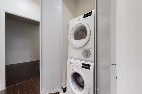 G07-38 Dan Leckie Way, Toronto, ON - Indoor Photo Showing Laundry Room