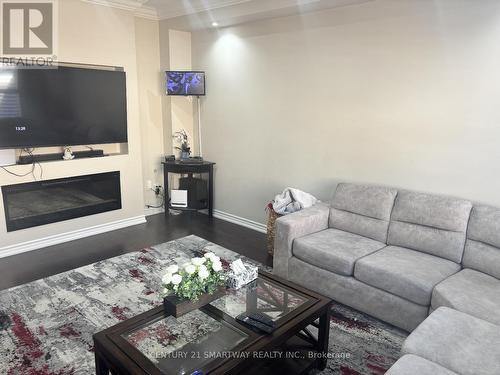25 Bucksaw Street, Brampton, ON - Indoor Photo Showing Living Room With Fireplace