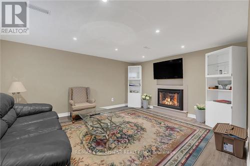 982 Highland Road E, Hamilton, ON - Indoor Photo Showing Living Room With Fireplace