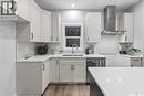 351 Asokan Bend, Saskatoon, SK  - Indoor Photo Showing Kitchen With Double Sink 