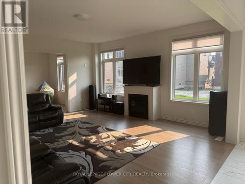 32 Twinleaf Crescent, Adjala-Tosorontio, ON - Indoor Photo Showing Living Room With Fireplace