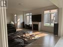 32 Twinleaf Crescent, Adjala-Tosorontio, ON  - Indoor Photo Showing Living Room With Fireplace 
