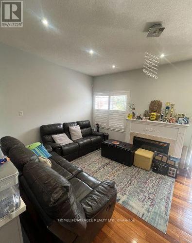 6912 Buttle Station Place, Mississauga, ON - Indoor Photo Showing Living Room With Fireplace