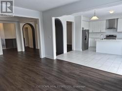 Living Room View to Kitchen and Family Room - 