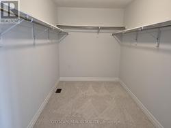 Primary Walk-In Closet - 
