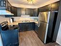 223 Lochrie Crescent, Saskatoon, SK  - Indoor Photo Showing Kitchen With Double Sink 