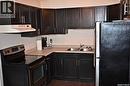 223 Lochrie Crescent, Saskatoon, SK  - Indoor Photo Showing Kitchen With Double Sink 