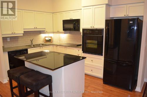 203 - 830 Scollard Court, Mississauga, ON - Indoor Photo Showing Kitchen With Double Sink