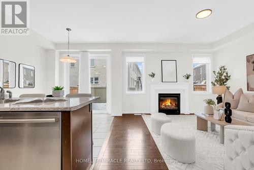 1344 Rose Way, Milton, ON - Indoor Photo Showing Living Room With Fireplace