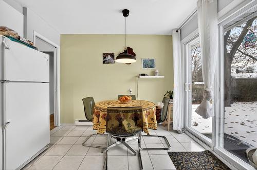 Kitchen - 6520 Av. Des Perruches, Laval (Sainte-Rose), QC - Indoor Photo Showing Dining Room