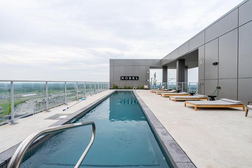 Piscine - 1612-60 Rue De L'Éclipse, Brossard, QC -  With In Ground Pool