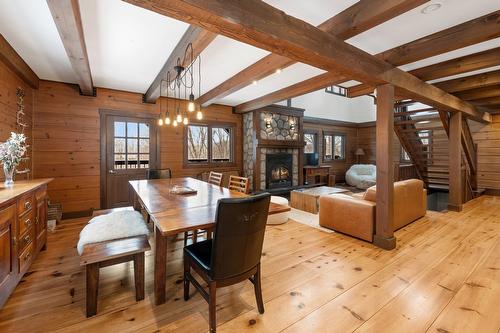 Salle à manger - 515  - 517 Crois. De La Coulée, Lac-Supérieur, QC - Indoor Photo Showing Dining Room With Fireplace