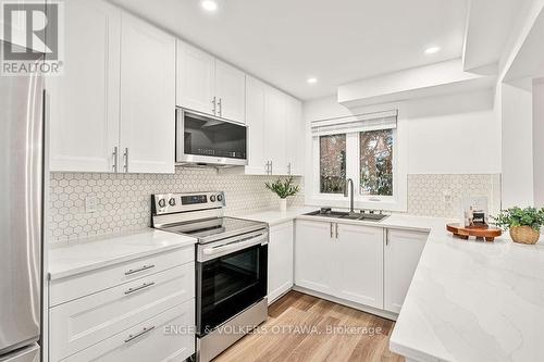 12 Bayside Private, Ottawa, ON - Indoor Photo Showing Kitchen With Stainless Steel Kitchen With Double Sink With Upgraded Kitchen