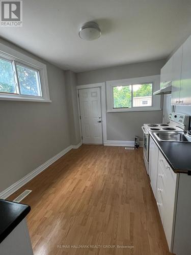 Access to the back from kitchen - A - 18 Jolliet Avenue, Ottawa, ON - Indoor Photo Showing Kitchen With Double Sink