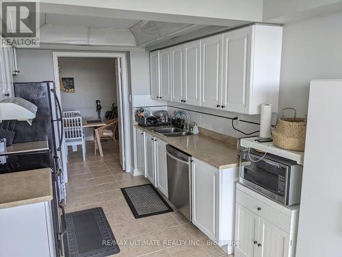 704 - 22 Hanover Road, Brampton, ON - Indoor Photo Showing Kitchen With Double Sink