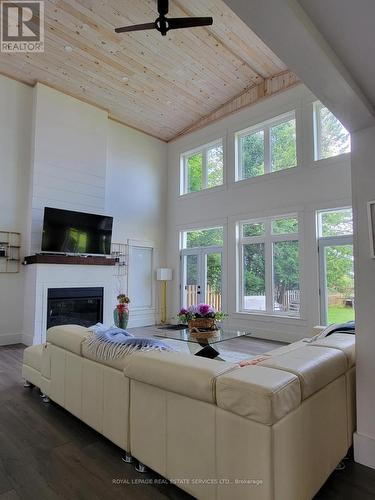 4 Crescent Road, Strong, ON - Indoor Photo Showing Living Room With Fireplace