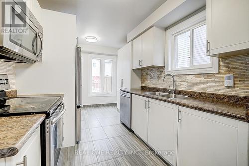 21 - 1485 Torrington Drive, Mississauga, ON - Indoor Photo Showing Kitchen With Double Sink