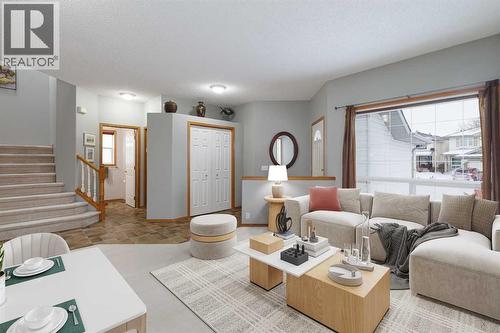 Virtually staged lrm drm / see how beautiful your furniture would look - 247 Mt Selkirk Close Se, Calgary, AB - Indoor Photo Showing Living Room