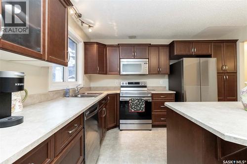 131 Tobin Crescent, Saskatoon, SK - Indoor Photo Showing Kitchen With Double Sink