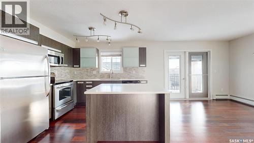312 1510 Neville Drive, Regina, SK - Indoor Photo Showing Kitchen With Stainless Steel Kitchen With Upgraded Kitchen