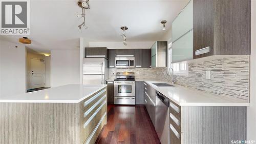 312 1510 Neville Drive, Regina, SK - Indoor Photo Showing Kitchen With Stainless Steel Kitchen With Double Sink With Upgraded Kitchen